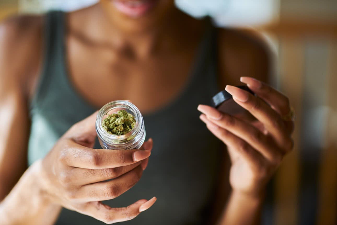 Women with cannabis product bought from THC.